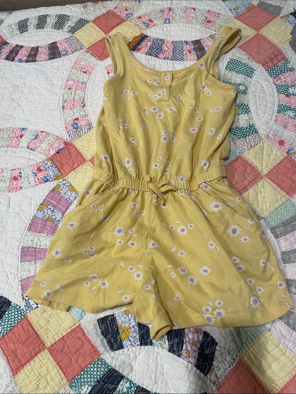 Girls 10-12 daisy print Cat and Jack romper.